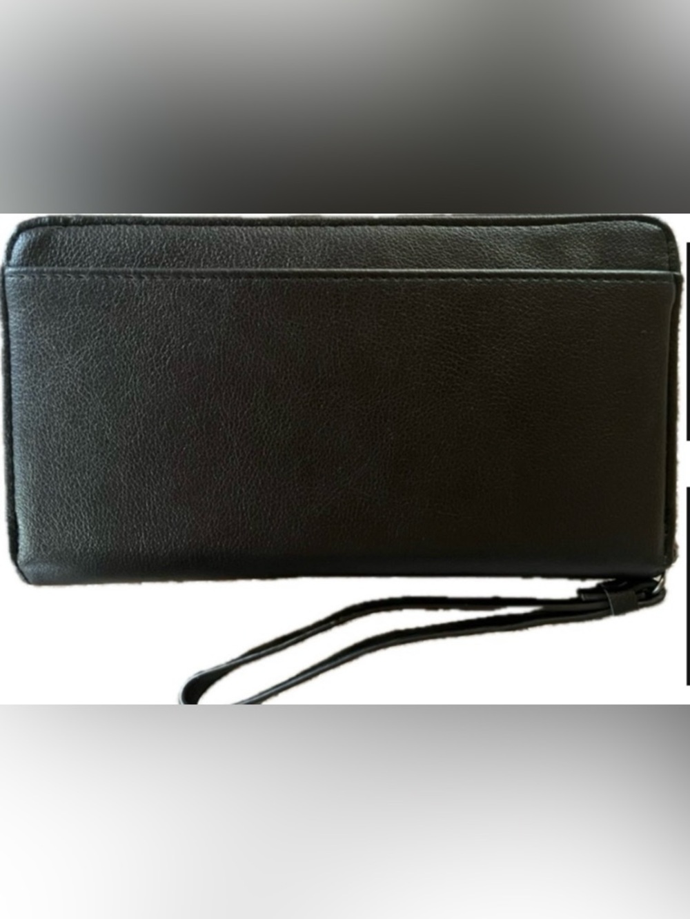 No Boundaries wallet/wristlet. New with tags. Plenty of space for your needs.